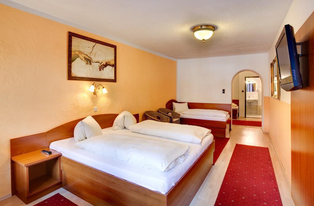 Cityhotel Schwarzer Baer Innsbruck Quarto foto